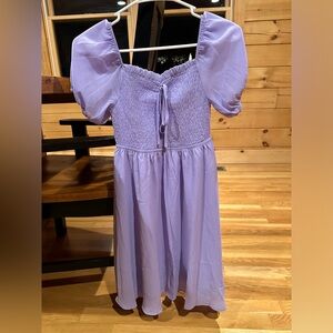 NWT size XS lavender/purple colored dress with puff sleeves. Brand is Byinns.